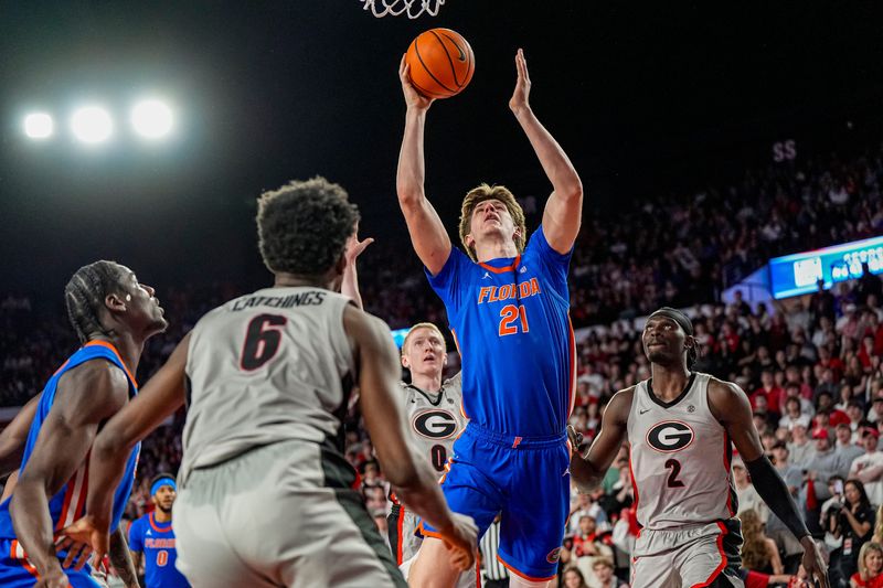 Feb 11, 2026; Athens, Georgia, USA; Florida Gators forward Alex Condon (21) goes to the basket against the Georgia Bulldogs during the second half at Stegeman Coliseum. Mandatory Credit: Dale Zanine-Imagn Images