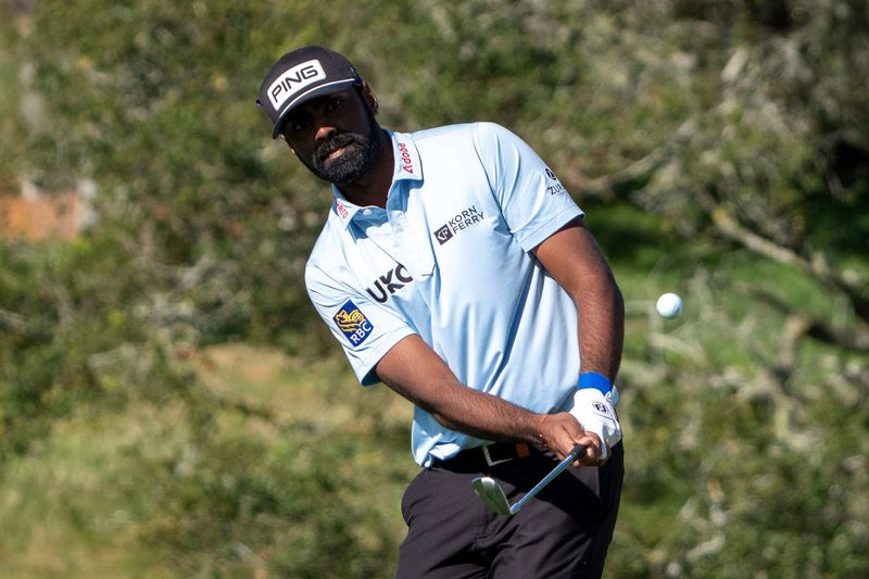 February 12, 2026; Pebble Beach, California, USA; Sahith Theegala hits his chip shot on the second hole during the first round of the AT&T Pebble Beach Pro-Am golf tournament at Pebble Beach Golf Links. Mandatory Credit: Kyle Terada-Imagn Images