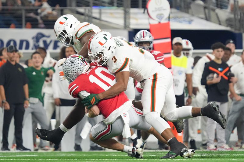 Dec 31, 2025; Arlington, TX, USA; Ohio State Buckeyes quarterback Julian Sayin (10) is sacked by Miami Hurricanes defensive lineman Akheem Mesidor (3) in the first quarter during the 2025 Cotton Bowl and quarterfinal game of the College Football Playoff at AT&T Stadium. Mandatory Credit: Raymond Carlin III-Imagn Images