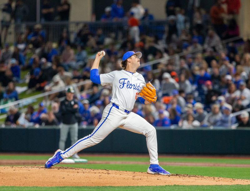 Florida's Liam Peterson (12) was the starting pitcher for the Gators on Opening Day against UAB, Friday, February 13, 2026, at Condron Family Ballpark in Gainesville, Florida. The Gators lost Game 1 to the Blazers 9-7. [Cyndi Chambers/ Gainesville Sun]