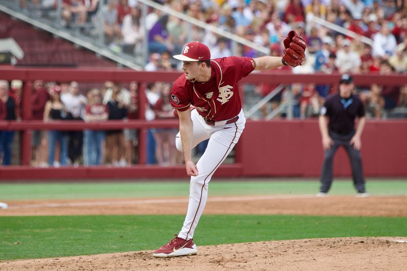Bryson Moore throws a pitch as Florida State baseball beat James Madison 16-5 on Saturday, Feb. 14 at Dick Howser Stadium