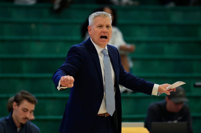 North Florida Ospreys head coach Bobby Kennen coaches during the first half of an NCAA men’s basketball game at Swisher Gymnasium, Saturday, Feb. 14, 2026, in Jacksonville, Fla. [Corey Perrine/Florida Times-Union]