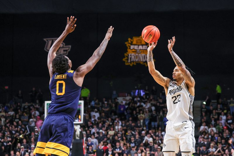 Feb 14, 2026; Orlando, Florida, USA; UCF Knights guard Chris Johnson (22) shoots against West Virginia Mountaineers forward Brenen Lorient (0) during the second half at Addition Financial Arena. Mandatory Credit: Mike Watters-Imagn Images