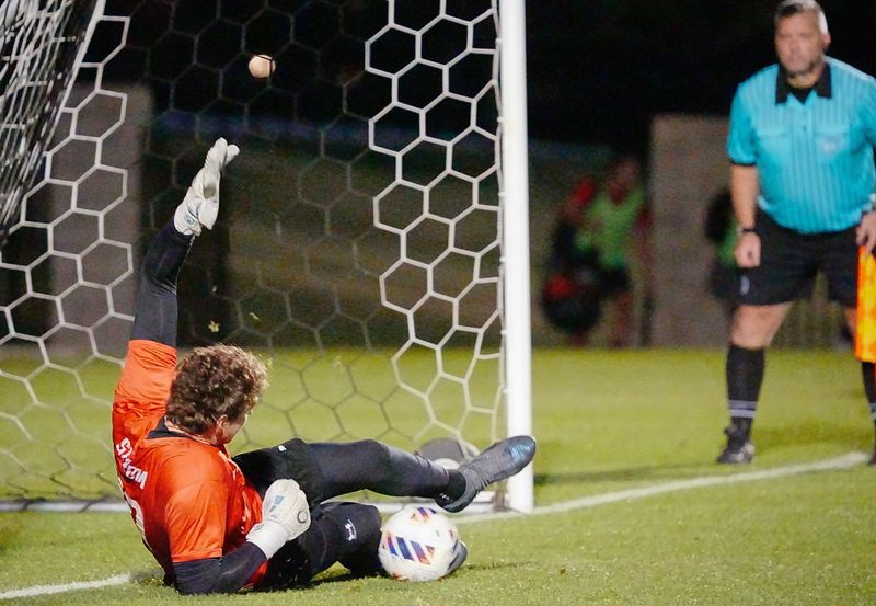 Holy Trinity goalkeeper Dustin Strom stops a penalty kick during the game against Westminster Christian in the Class 2A boys soccer state semifinal February 17, 2026. Craig Bailey, FLORIDA TODAY via USA TODAY Network