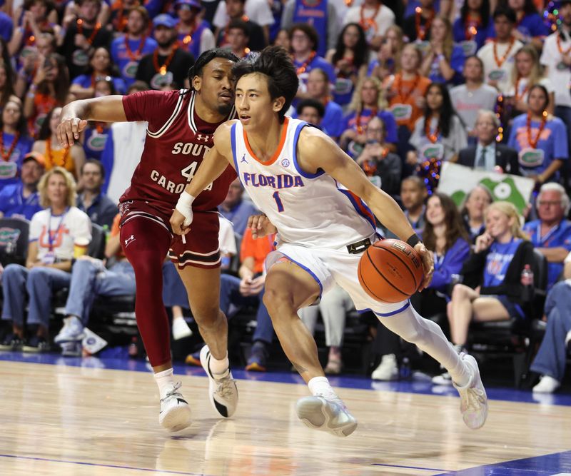 Florida guard Xaivian Lee (1) drives during the second half of a NCAA mens basketball game at Steven C. O'Connell Center Exactek arena in Gainesville, FL on Tuesday, February 17, 2026. [Alan Youngblood/Gainesville Sun]