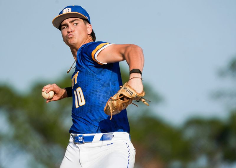 Martin County pitcher Preston Sullivan throws in a high school boys baseball game against Port St. Lucie, Feb. 19, 2026, at Port St. Lucie High School.