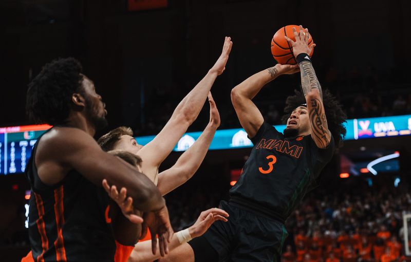 Feb 21, 2026; Charlottesville, Virginia, USA; Miami (FL) Hurricanes guard Tre Donaldson (3) shoots the ball while Virginia Cavaliers forward Thijs de Ridder (28) defends during the first half at John Paul Jones Arena. Mandatory Credit: Emily Faith Morgan-Imagn Images