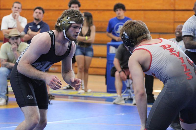 Lake Gibson wrestling won the Class 2A, District 7 IBT districts Saturday, Feb. 21, 2026, at Auburndale High School. All of Polk County Class 2A, District 7 competed in this matchup. Pictured here Lake Gibson junior wrestler Mason Desandolo competing against Kathleen's Ryder Osborn.