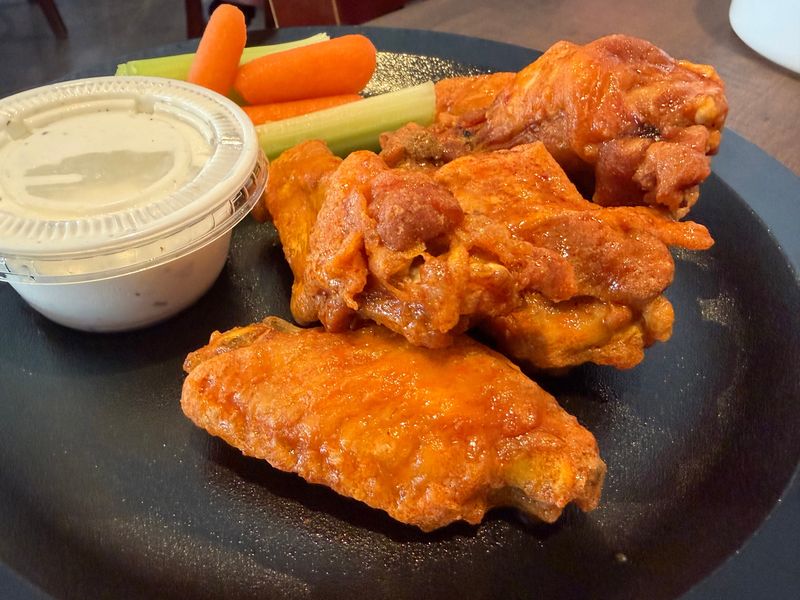 A five wing order of mild medium wings, served at Duff's Famous Wings in Sarasota. The restaurant opened for business at 3900 Clark Road on Feb. 9.