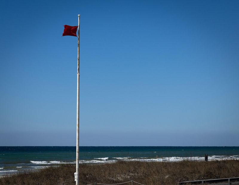 A red flag near Russell-Fields Pier in Panama City Beach, Fla., Feb. 23, 2026. (Tyler Orsburn/News Herald)