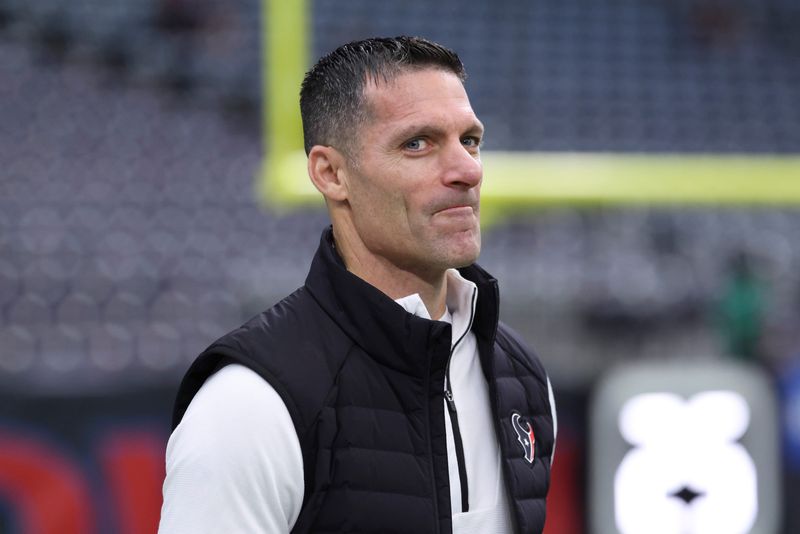 Jan 4, 2026; Houston, Texas, USA; Houston Texans general manager Nick Caserio walks on the field before the game against the Indianapolis Colts at NRG Stadium. Mandatory Credit: Troy Taormina-Imagn Images