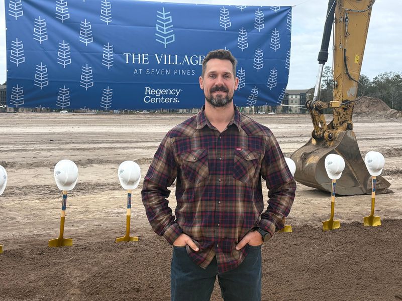 Chef Michael Cooney poses at the groundbreaking of what will be the second Ember & Iron location and his third Northeast Florida restaurant with co-owner Brittany Cooney.