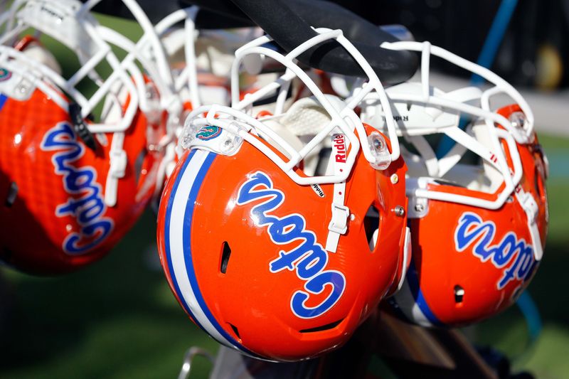 Jan 2, 2017; Tampa , FL, USA; Florida Gators helmets hang on the bench in the during the second half against the Iowa Hawkeyes at Raymond James Stadium. Florida Gators defeated the Iowa Hawkeyes 30-3. Mandatory Credit: Kim Klement-USA TODAY Sports