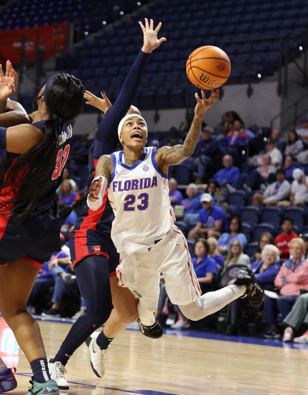 Florida guard Liv McGill (23) shoots during the first half of an NCAA women’s basketball game at Steven C. O'Connell Center Exactek arena in Gainesville, FL on Thursday, February 26, 2026. [Alan Youngblood/Gainesville Sun]