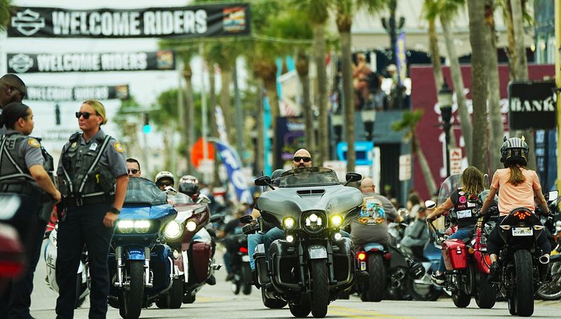 Bikers cruise along Main Street in Daytona Beach during the first day of Bike Week, Friday, Feb. 27, 2026.