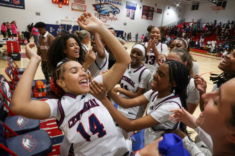 St. Lucie West Centennial celebrates winning the Region 2-7A girls basketball final 52-40 against Treasure Coast on Feb. 27, 2026, in Port St. Lucie.