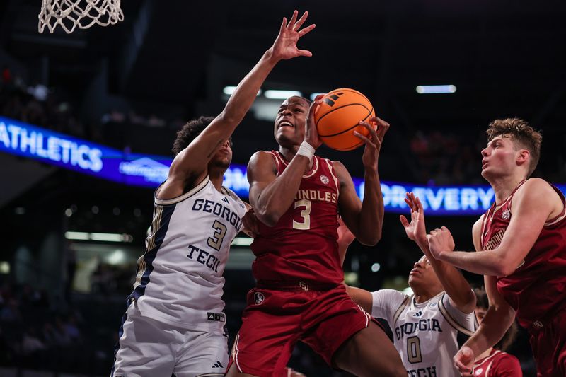Feb 28, 2026; Atlanta, Georgia, USA; Florida State Seminoles guard Thomas Bassong (3) shoots past Georgia Tech Yellow Jackets guard Jaeden Mustaf (3) in the first half at McCamish Pavilion. Mandatory Credit: Brett Davis-Imagn Images