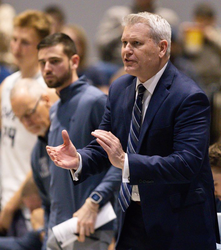 University of North Florida head coach Bobby Kennen gets his team excited during the first period. University of North Florida hosted Jacksonville University hosted in mens basketball SaturdayFebruary 28, 2026 in Jacksonville, Fla. [Doug Engle/Florida Times-Union]