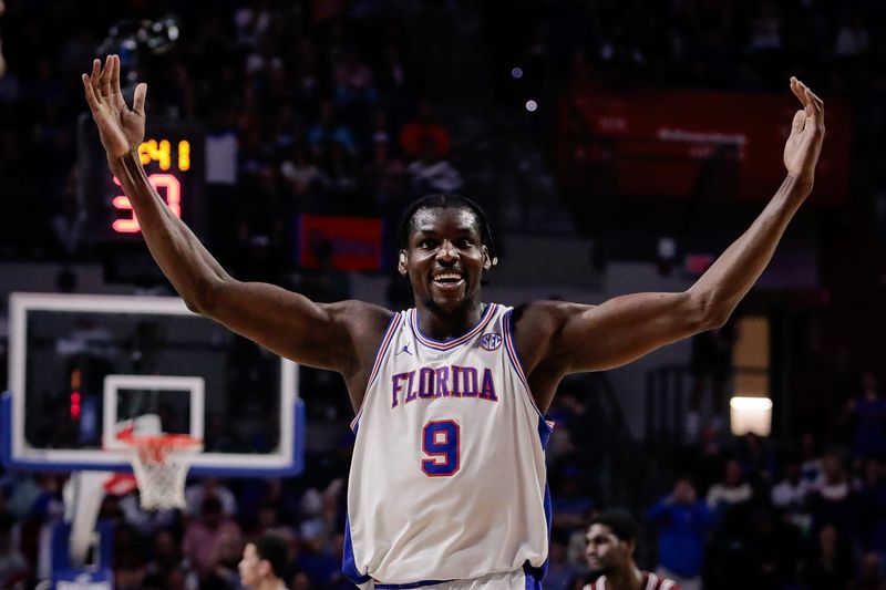 Feb 28, 2026; Gainesville, Florida, USA; Florida Gators center Rueben Chinyelu (9) celebrates against the Arkansas Razorbacks during the first half at Exactech Arena at the Stephen C. O'Connell Center. Mandatory Credit: Travis Register-Imagn Images