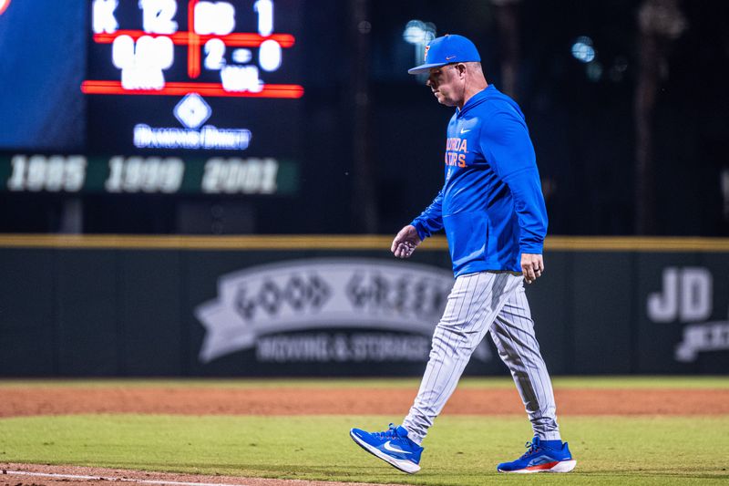 Florida head coach Kevin O'Sullivan walking off the field.