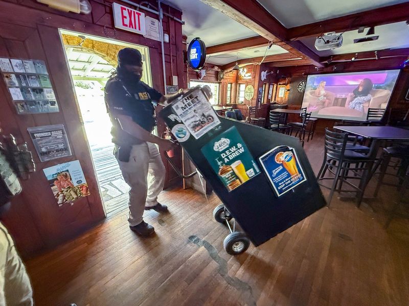 Flagler County Sheriff's deputies seize gambling machines Tuesday, Feb. 24, 2026, as part of a multi-county sting called 'Operation Reels of Fortune."