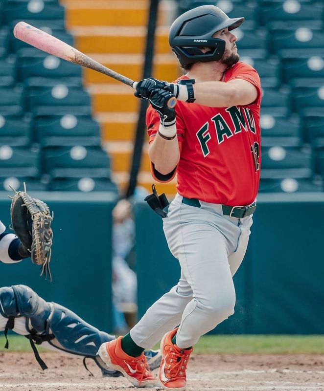 Florida A&M Rattlers' Alex Monile eyes a flyball during an NCAA baseball game, part of the 2026 Andre Dawson Classic at the Jackie Robinson Training Complex in Vero Beach, Florida.