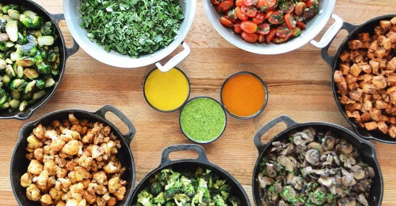 Bolay lets each patron customize bowls with grains, greens, proteins and toppings.