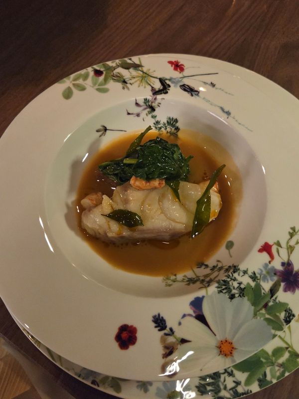 Emelina uses a different plate for each course, reinforcing the sense that no two moments of the tasting menu are meant to feel the same.