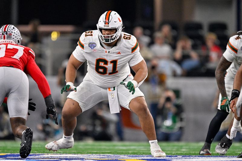 Miami Hurricanes offensive lineman Francis Mauigoa (61) blocks the rush Dec. 31 during the 2025 Cotton Bowl and quarterfinal game of the College Football Playoff at AT&T Stadium in Arlington, Texas.