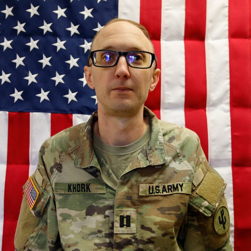 Capt. Cody Khork, a resident of Lakeland, Fla., enlisted as a 13P (Multiple Launch Rocket System / Fire Direction Specialist) in the National Guard in 2009. He commissioned as a Military Police Officer in the Army Reserve in 2014. He deployed to Saudia Arabia in 2018, Guantanamo Bay, Cuba, in 2021, and Poland in 2024. Khork's awards and decorations include the Meritorious Service Medal, Army Commendation Medal, Joint Service Achievement Medal, Army Superior Unit Award, Army Reserve Component Achievement Medal, National Defense Service Medal, Global War on Terrorism Expeditionary Service Medal, Global War on Terrorism Service Medal, Korea Defense Service Medal, Armed Forces Service Medal, Army Service Ribbon, Overseas Service Ribbon, Army Reserve Component Overseas Training Ribbon, Armed Forces Reserve Medal with 10 Year Device and "M" Device, and the Military Outstanding Volunteer Service Medal.