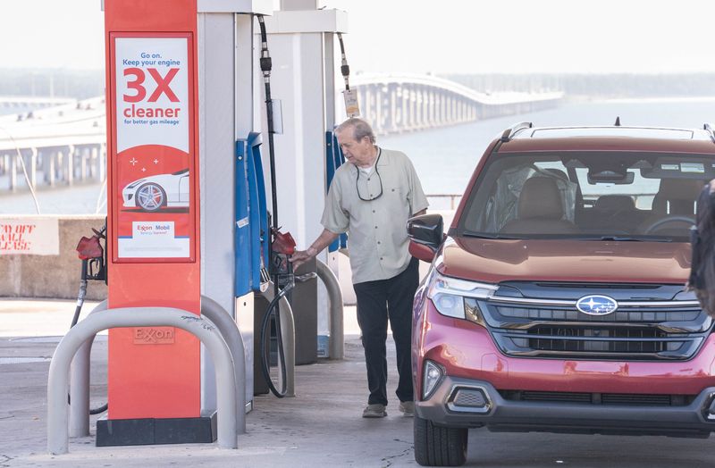 Ron Dohm gets gas at the station off I-10 in Pensacola on March 4, 2026.