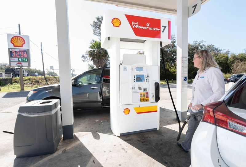 Danielle Ross fills her gas tank at The Convenience Store on Scenic Highway in Pensacola on March 4, 2026.