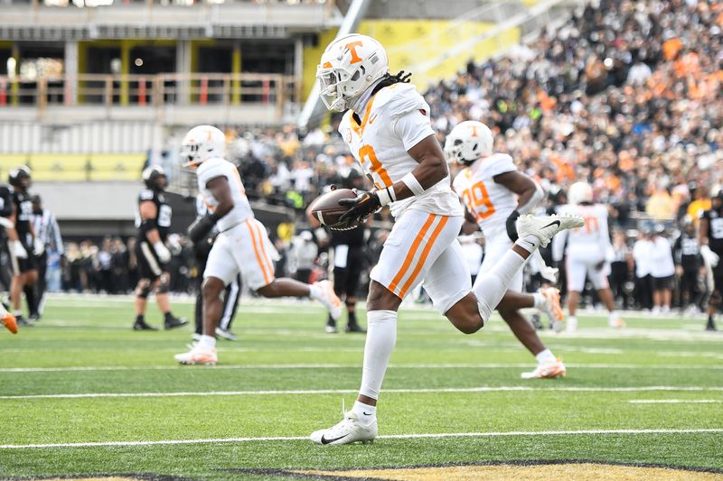 Tennessee Volunteers defensive back Jermod McCoy (3) celebrates an interception Nov. 30, 2024 against the Vanderbilt Commodores during the first half at FirstBank Stadium in Nashville,