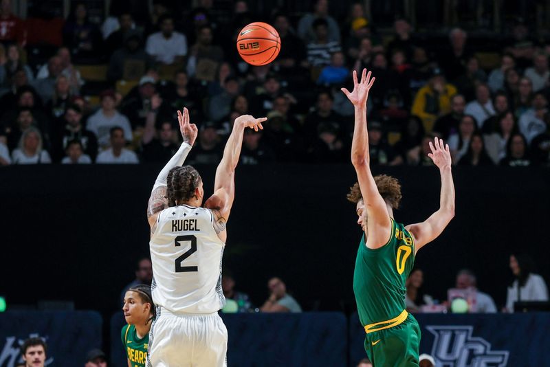Riley Kugel (2) scored 18 points in UCF's loss to Oklahoma State Tuesday.