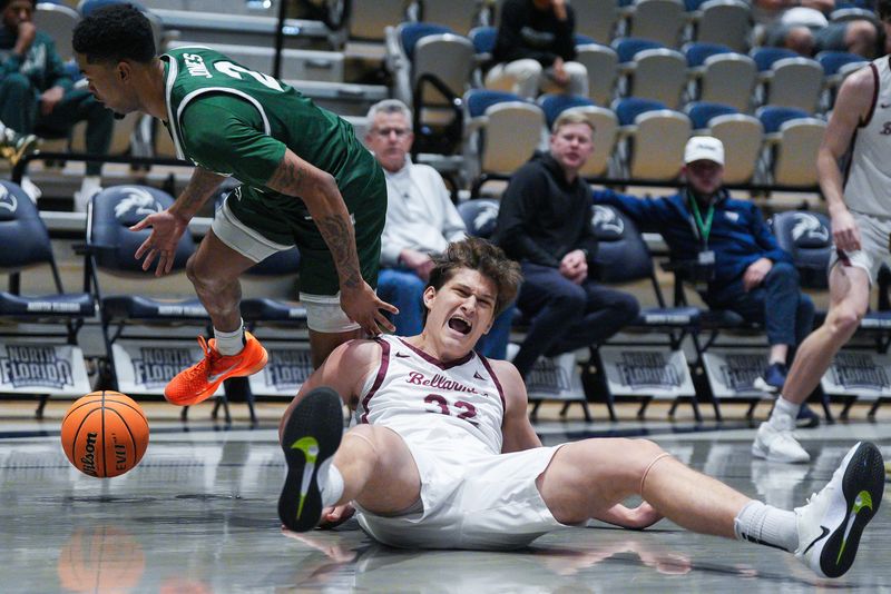 Jacksonville University guard Jaylen Jones (2) steals the ball away from Bellarmine forward Jack Karasinski (32) as he hits the floor during the first period in the ASUN men's basketball tournament between Jacksonville and Bellarmine Wednesday March 4, 2026 at UNF Arena in Jacksonville, Fla. [Doug Engle/Florida Times-Union]