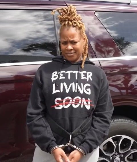 D'Zyre Youngblood, 28, of Atlanta, meets with Sheriff Mike Chitwood and deputies upon arriving at the Volusia County Branch Jail on Tuesday, March 3. Youngblood and a Georgia prison ring stole $79,000 from a Deltona woman in a telephone scam, deputies said.