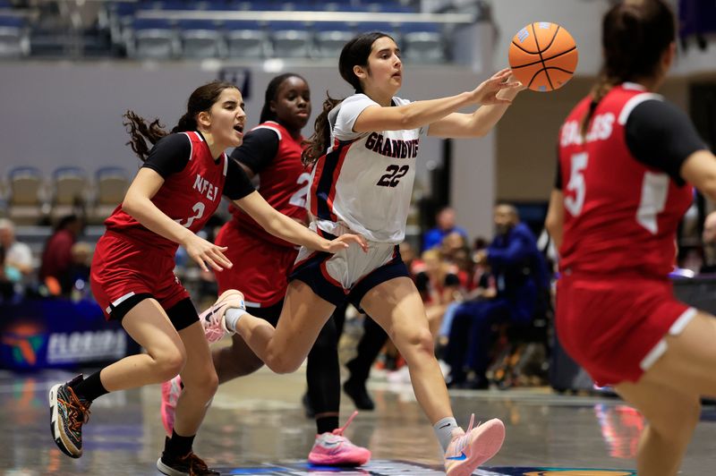 Grandview's Jada Burns (22) passes the ball during the fourth quarter of an FHSAA girls basketball Class 1A semifinal at UNF Arena, Thursday, March 5, 2026, in Jacksonville, Fla. Grandview defeated North Florida Educational Institute 65-36. [Corey Perrine/Florida Times-Union]