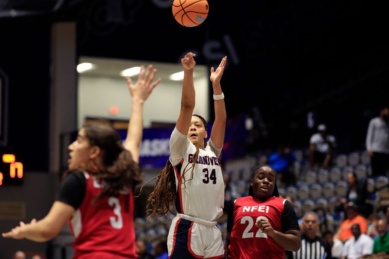 Grandview's Jasleen Green (34) takes the final shot during the second quarter of an FHSAA girls basketball Class 1A semifinal at UNF Arena against NFEI.