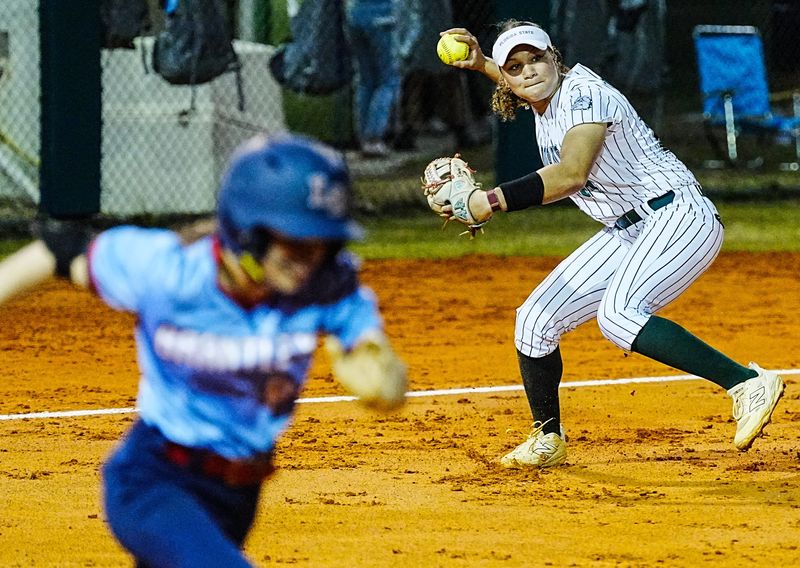Layna Ayala of Melbourne throws out a Lake Brantley baserunner in high school softball March 6, 2026, Craig Bailey/FLORIDA TODAY via USA TODAY NETWORK
