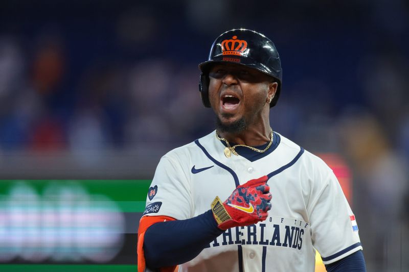 Mar 7, 2026; Miami, FL, United States; Netherlands second baseman Ozzie Albies (1) rounds the bases after hitting a three-run home run against Nicaragua during the ninth inning at loanDepot Park. Mandatory Credit: Sam Navarro-Imagn Images