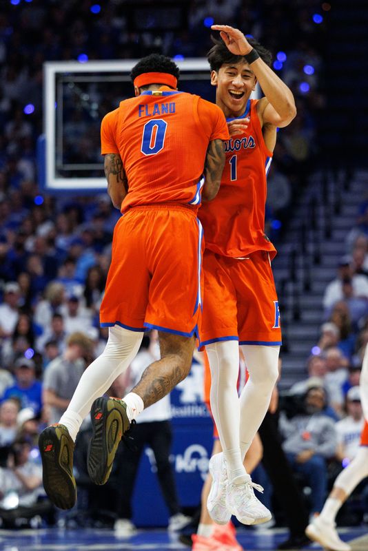 Mar 7, 2026; Lexington, Kentucky, USA; Florida Gators guard Boogie Fland (0) celebrates with guard Xaivian Lee (1) during the first half against the Kentucky Wildcats at Rupp Arena at Central Bank Center. Mandatory Credit: Jordan Prather-Imagn Images