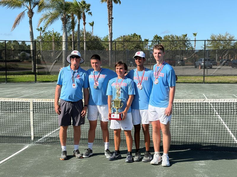 Seabreeze's boys tennis team poses with the Five Star Conference trophy after winning the tournament for the first time in 10 years at Florida Tennis Center on Saturday, March 7, 2026.