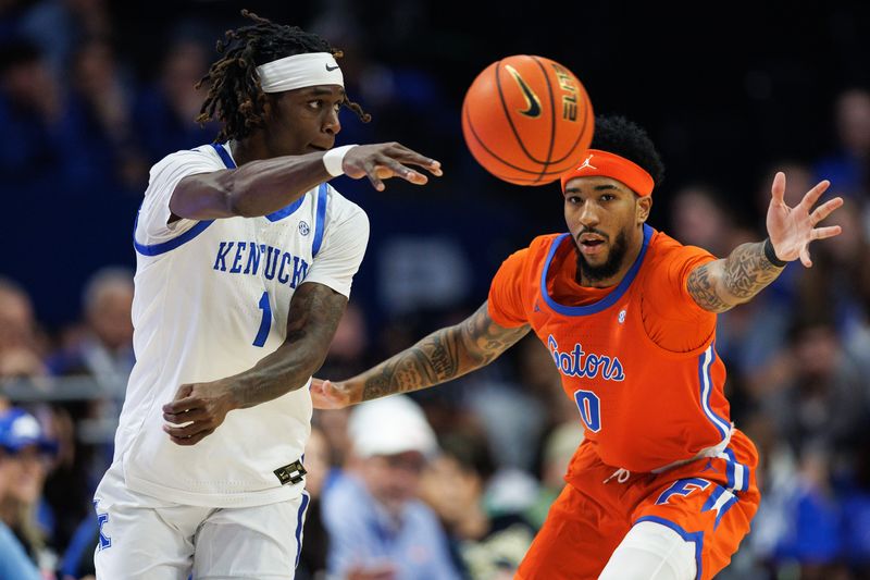 Mar 7, 2026; Lexington, Kentucky, USA; Kentucky Wildcats guard Denzel Aberdeen (1) passes the ball around Florida Gators guard Boogie Fland (0) during the first half at Rupp Arena at Central Bank Center. Mandatory Credit: Jordan Prather-Imagn Images