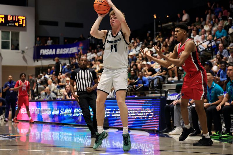Providence's Ryan Gornto (14) shoots a three-point basket as Miami Country Day's Jordan Corbitt (11) complains during the fourth quarter of an FHSAA boys basketball Class 2A final at UNF Arena, Saturday, March 7, 2026, in Jacksonville, Fla. The Providence Stallions defeated the Miami Country Day Spartans 51-43, capturing the state title. [Corey Perrine/Florida Times-Union]
