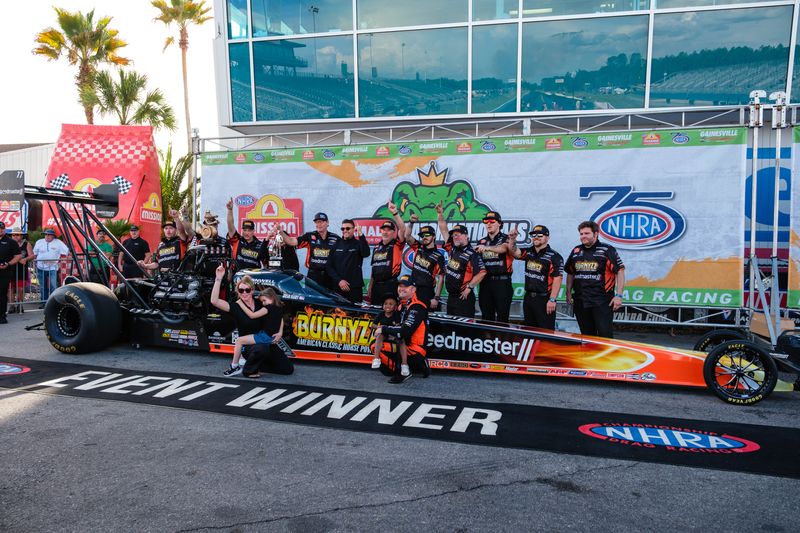 Top fuel driver Jason Hart celebrates with his family and team after winning the finals of the 2026 NHRA Gatornationals at The Gainesville Raceway on Sunday, March 8