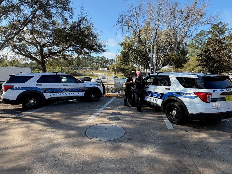Gainesville Police Department officers secure the scene in front of the Circle K on Williston Road at I-75 where a dead body was discovered the morning of March 9, 2026.