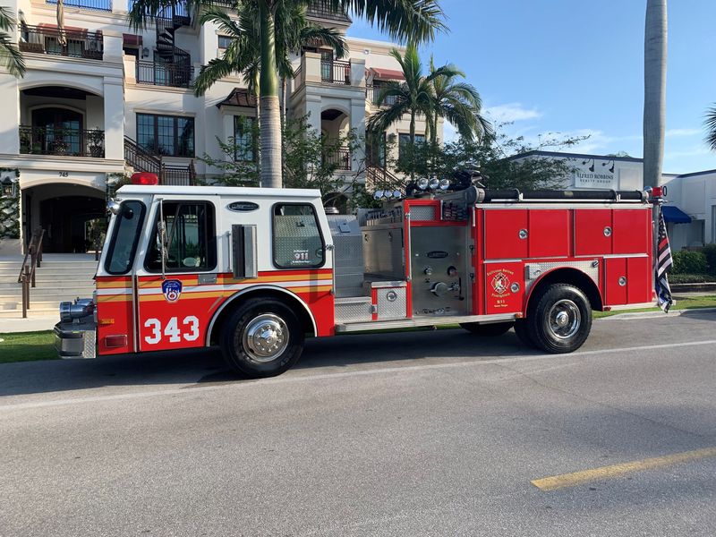 An FDNY fire truck that belongs to a retired group of New York firefighters in Naples, Florida. They're hosting a comedy show March 16, 2026, to raise money to help repair and upgrade the truck that is often featured in Naples parades.