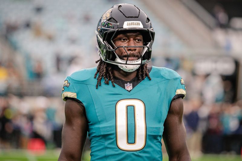 Dec 7, 2025; Jacksonville, Florida, USA;Jacksonville Jaguars linebacker Devin Lloyd (0) stands on the field during pregame warmups against the Indianapolis Colts at EverBank Stadium. Mandatory Credit: Travis Register-Imagn Images