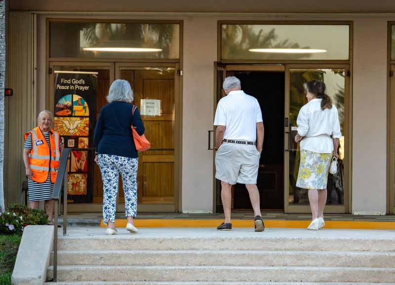Palm Beach residents enter St. Edward Parish Hall on March 10 to cast ballots in the Group 1 Town Council election. On March 24, Palm Beach polling sites will be open 7 a.m.-7 p.m. for a special general election to fill the Florida House of Representatives District 87 seat.