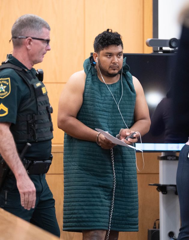 Samuel Maldonado Erazo is escorted to the defense podium during a pretrial detention hearing at the M.C. Blanchard Judicial Building in Pensacola on March 10, 2026. Erazo is accused of beating his 3-year-old nephew until the boy went into cardiac arrest and died.